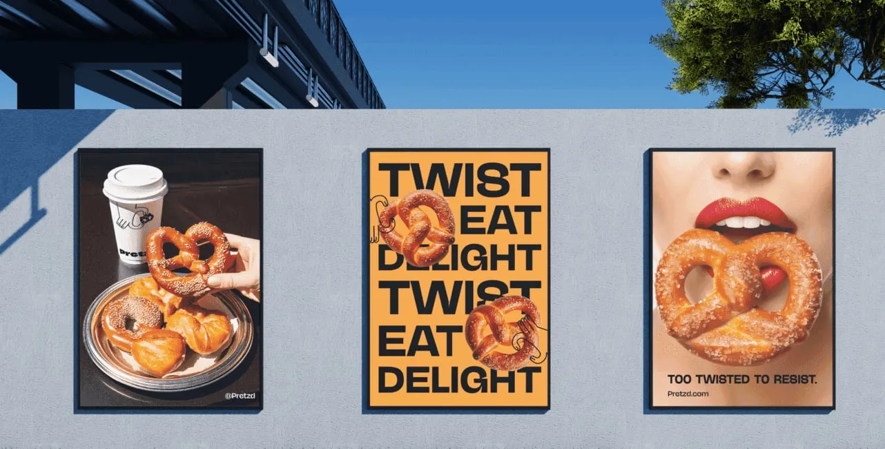 Pretz'd “Twist, eat, delight” posters on an outdoor wall