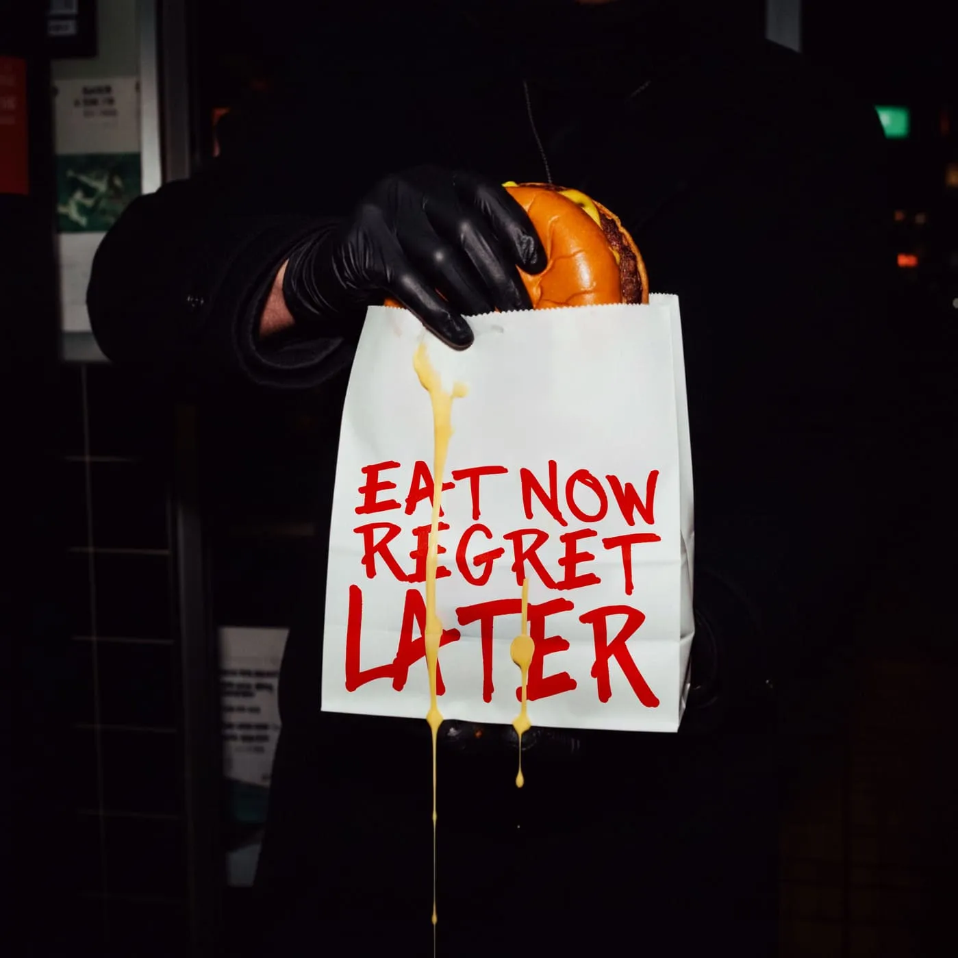 “Eat now regret later” burger bag for a fast-food brand